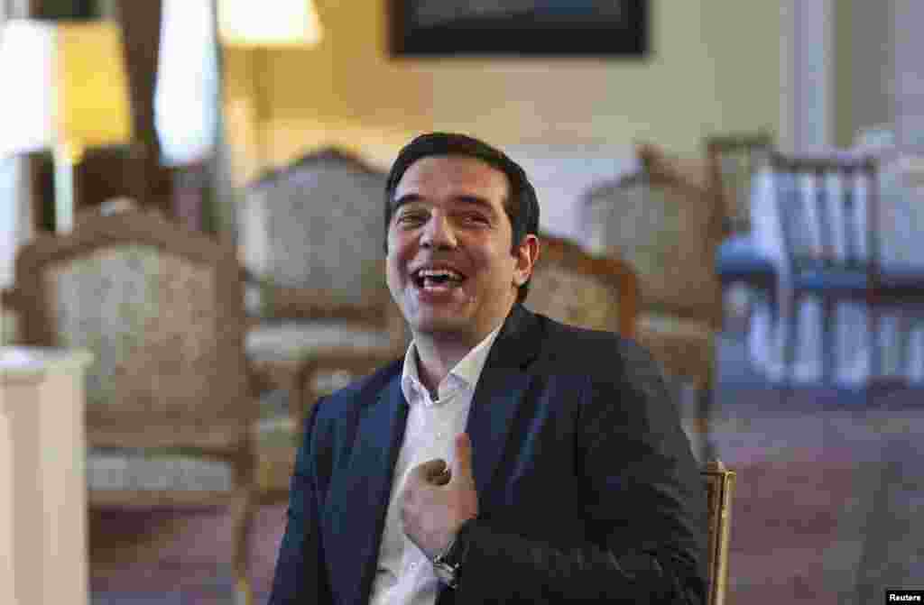 Yunanıstanın baş naziri Alexis Tsipras prezident sarayında olarkən. REUTERS/Ronen Zvulun