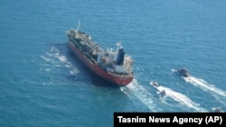 The South Korean-flagged Hankuk Chemi being escorted by IRGC boats near the Strait of Hormuz on January 4