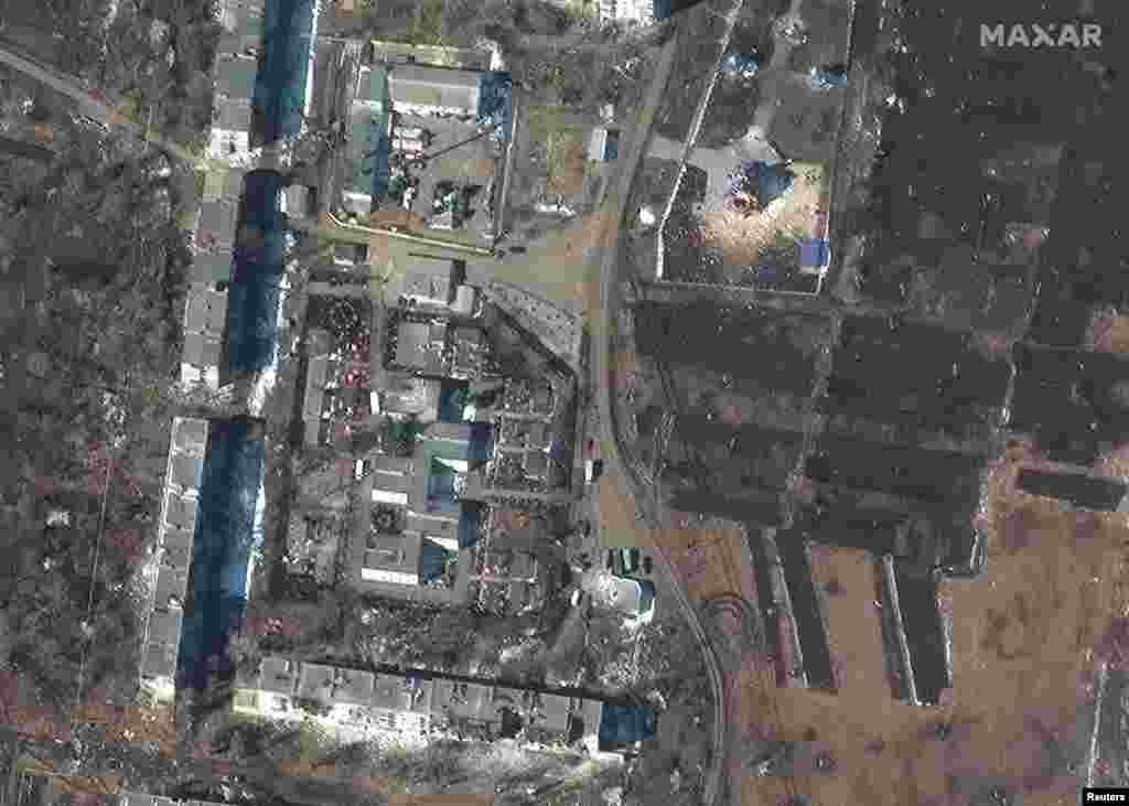 Зруйновані багатоквартирні будинки та церква у Сумах. Україна. Фото&nbsp;Maxar Technologies, 14 березня 2022 року &nbsp;