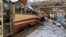 A resident examines a destroyed tram depot in Kharkiv on March 12.