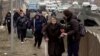 Ukrainians' Arduous Escape From Irpin After Russian Attacks screen grab