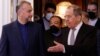 Russian Foreign Minister Sergei Lavrov (right) and Iranian Foreign Minister Hossein Amir-Abdollahian enter a hall during a meeting in Moscow in March 15.