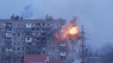 'Who Will Bring Back Our Children?' Russian Tanks Shell Residential Buildings In Mariupol screen grab