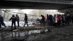 The Torturous Odyssey Of Ukrainians Evacuating Kyiv's Suburbs