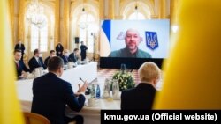 Прем’єр-міністр Денис Шмигаль дистанційно бере участь у зустрічі представників країн Люблінського трикутника, Варшава, 14 березня 2022 року
