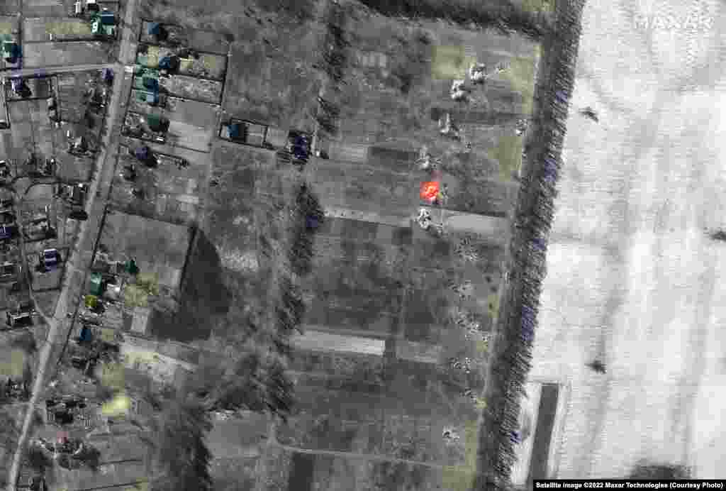 Multispectral satellite images of a Russian artillery battalion in Ozera, near Antonov International Airport, actively firing in a southeasterly direction.