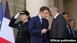 France - French President Emmanuel Macron greets Armenian Prime Minister Nikol Pashinian at the Elysee Palace, Paris, March 9, 2022.