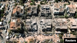 Israelul atrage atenția că rachetele iraniene îi pot „copleși” sistemul de apărare, cum s-a întâmplat pe 14 iunie 2025 într-un cartier din Rishon LeZion (în imagine).