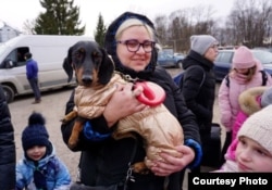 Украинская беженка с собакой