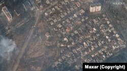 Azért állították bíróság elé, mert a polgári infrastruktúra elleni orosz támadásokról posztolt. A képen lerombolt otthonok Mariupolban, Ukrajnában 2022. március 9. 