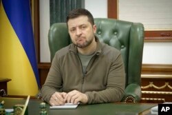 Ukrainian President Volodymyr Zelenskiy speaks from his office in the capital in a video posted on Facebook early on March 12.