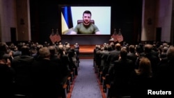 Ukrainian President Volodymyr Zelenskiy delivers a video address to members of the U.S. Congress in Washington on March 16. 