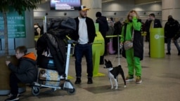 Passengers at Moscow's Domodedovo airport on March 5, after S7 Airlines cancelled all its international flights due to sanctions.