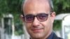 Iranian journalist and economy commentator Behzad Ahmadinia.