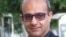 Iranian journalist and economy commentator Behzad Ahmadinia.