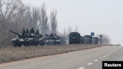 A convoy of pro-Russian troops on the move in the Donetsk region on March 12. 