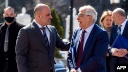 Macedonian Prime Minister Dimitar Kovacevski (left) greets EU foreign policy chief Josep Borrell in Skopje on March 14.