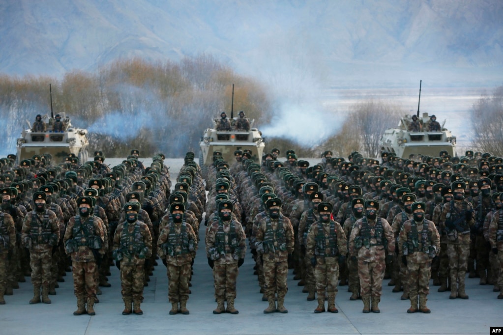 Chinese People's Liberation Army soldiers undergo military training near the Pamir Mountains in Kashgar, Xinjiang, in January.