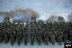 Chinese People's Liberation Army soldiers undergo military training near the Pamir Mountains in Kashgar, Xinjiang, in January.