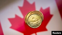 Kanada je preko svoje Agencije za međunarodni razvoj (CIDA) provela više od 120 projekata u BiH, vrijednih blizu stotinu miliona eura (na fotografiji kovanice kandskog dolara)
