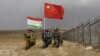 Пограничники Китая и Таджикистана совместно патрулируют участок границы, 17 сентября 2017 года
