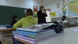 School in Sarajevo, the teacher and kids in class.