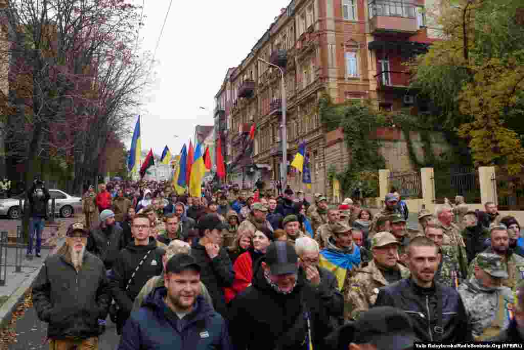 Some marchers in Dnipro carried the black and red flag of the UPA.