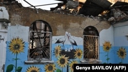 A painting on a wall at a heavily damaged cultural center in Irpin, northwest of Kyiv (file photo)