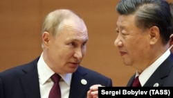 Russian President Vladimir Putin (left) and China's President Xi Jinping (file photo)