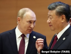 Владимир Путин және Си Цзиньпин Самарқандағы ШЫҰ саммитінде, Өзбекстан, 16 қыркүйек 2022 жыл.