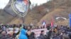 WATCH: Serbian Far-Right Protesters Try To Break Through Police Cordons Into Kosovo