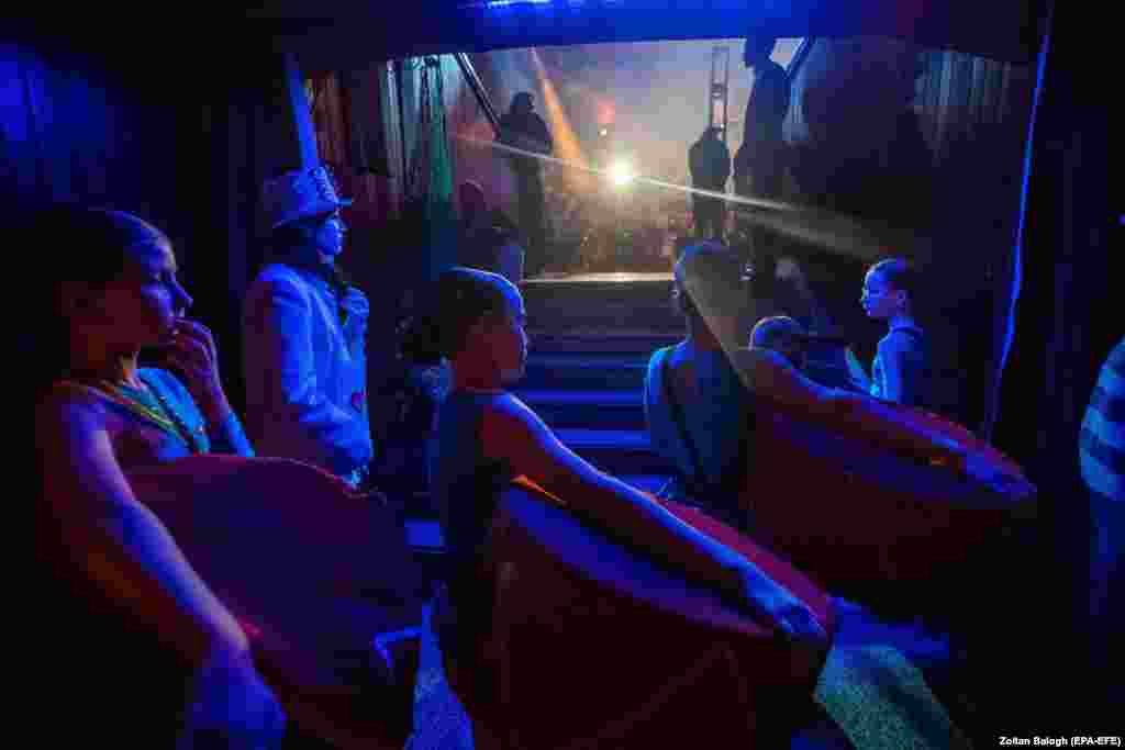 Young acrobats wait for their turn during the Ukrainian international children&#39;s circus festival Yaskrava Arena Dnipro at the Capital Circus in Budapest.