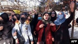 Afghan women protest in Kabul against the Taliban's ban on letting females attend universities. (file photo)