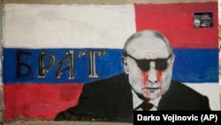 Мурал с изображением президента России Владимира Путина на одной из улиц Белграда