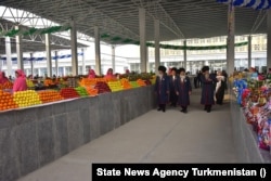 Turkmen state media follows the government's narrative of "prosperity" and "happiness" in the country.