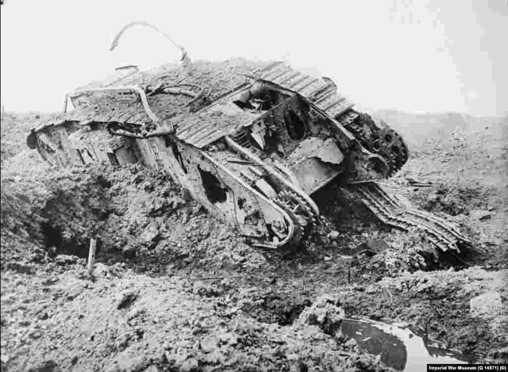A British tank that was destroyed by a direct hit from an artillery shell on an unidentified battlefield of World War I.