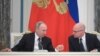 Russian President Vladimir Putin (left) and Sergei Kiriyenko (file photo)