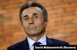 Bidzina Ivanishvili, then prime minister, attends a news conference in Tbilisi in June 2016.