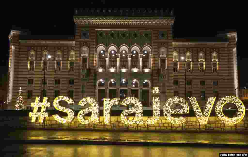 The Town Hall in the old part of the city of Sarajevo is illuminated on December 16.