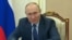 Russian President Vladimir Putin said on December 9 that Moscow could adopt what he described as a U.S. concept of using preemptive military strikes, noting it has the weapons to do the job.