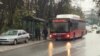 People at the bus stop entering in a bus in Skopje North Macedonia