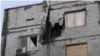 Пошкоджений обстрілом житловий будинок у Херсоні, грудень 2022 року. Фото ілюстративне