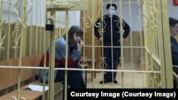 Nineteen-year-old Olesya Krivtsova in a courtroom in Arkhangelsk.