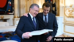 Uzbek President Shavkat Mirziyoyev and French President Emmanuel Macron during a state visit to Paris in November.