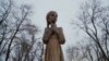 Statuia cunoscută sub numele de „Trista amintire a copilăriei” care simbolizează Holodomor, în centrul Kievului.
