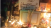 People gather at the grave of one of the protesters killed in the recent wave of protests in Iran on December 21.