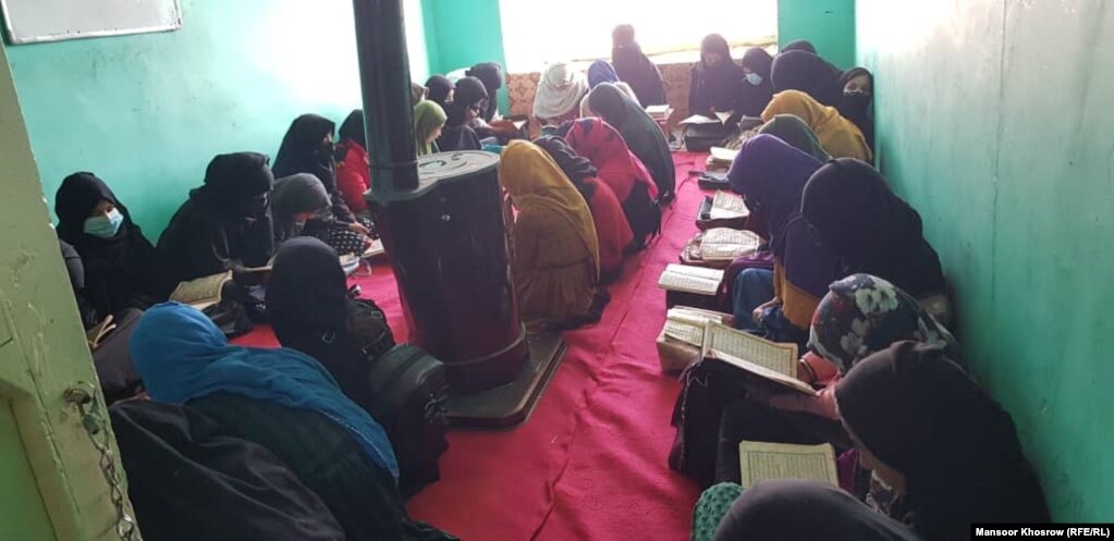 Female students attend a madrasah in Ghor Province. For many, it is the only means of getting an education -- albeit one limited to religious studies.