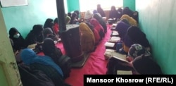 Female students attend a madrasah in Ghor Province. For many, it is the only means of getting an education -- albeit one limited to religious studies.