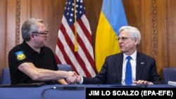 Procurorul general SUA, Merrick Garland, și procurorul general ucrainean Andri Kostin la Departamentul de Justiție. Washington, 20 septembrie 2022