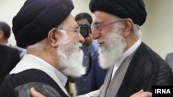 علی خامنه‌ای و احمد علم الهدی